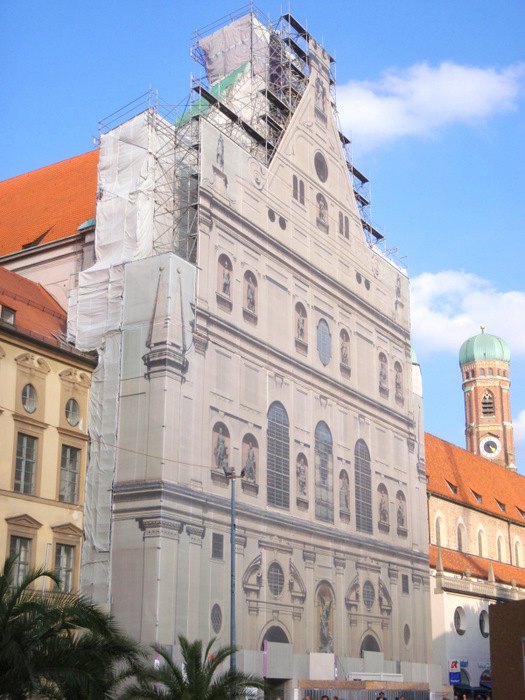 a giant photograph is placed over the scaffolding.